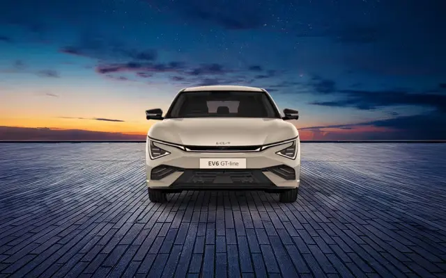 Kia EV6 electric car with modern design, LED headlights, and sporty profile, highlighting its premium features.