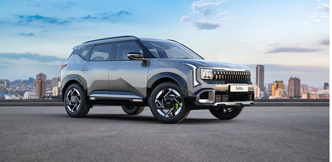 White 2026 Kia Seltos parked in a modern dealership showroom with premium lighting and clean interior design