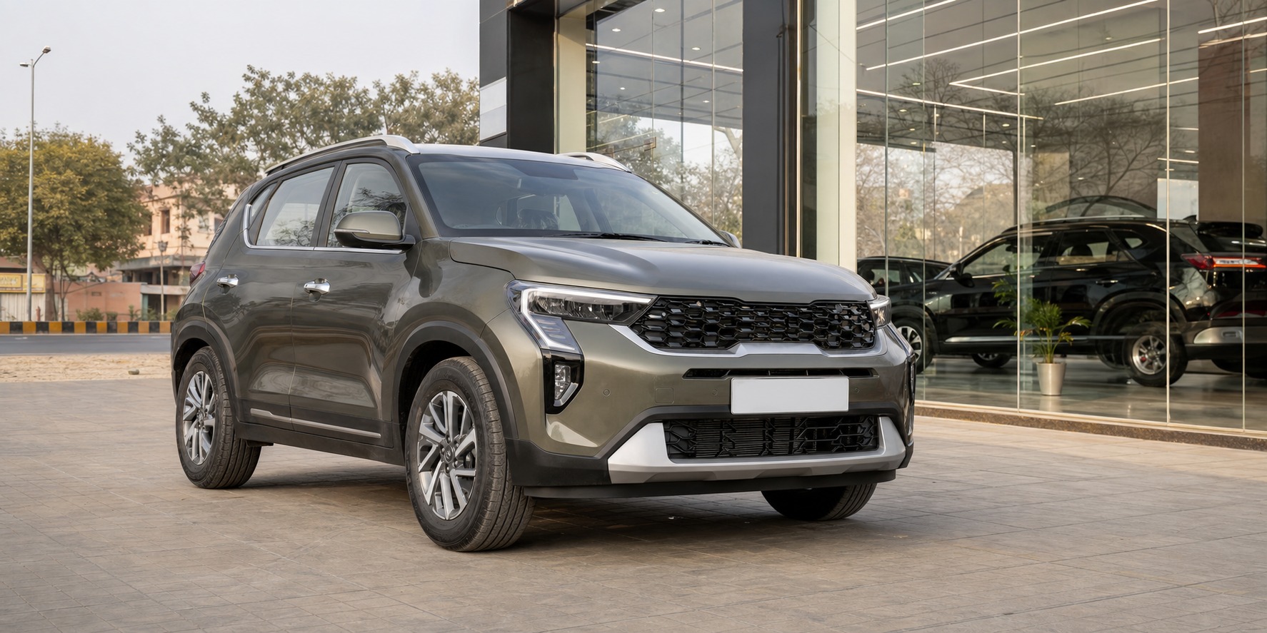Best Kia Sonet variant Dausa hero image showing a Kia Sonet at a Rajasthan dealership for city and family buyers comparing trims.